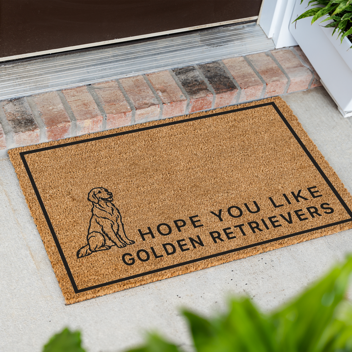 Hope You Like Golden Retrievers coir doormat with a drawing of a sitting golden retriever at an angle on a front porch by a brick step