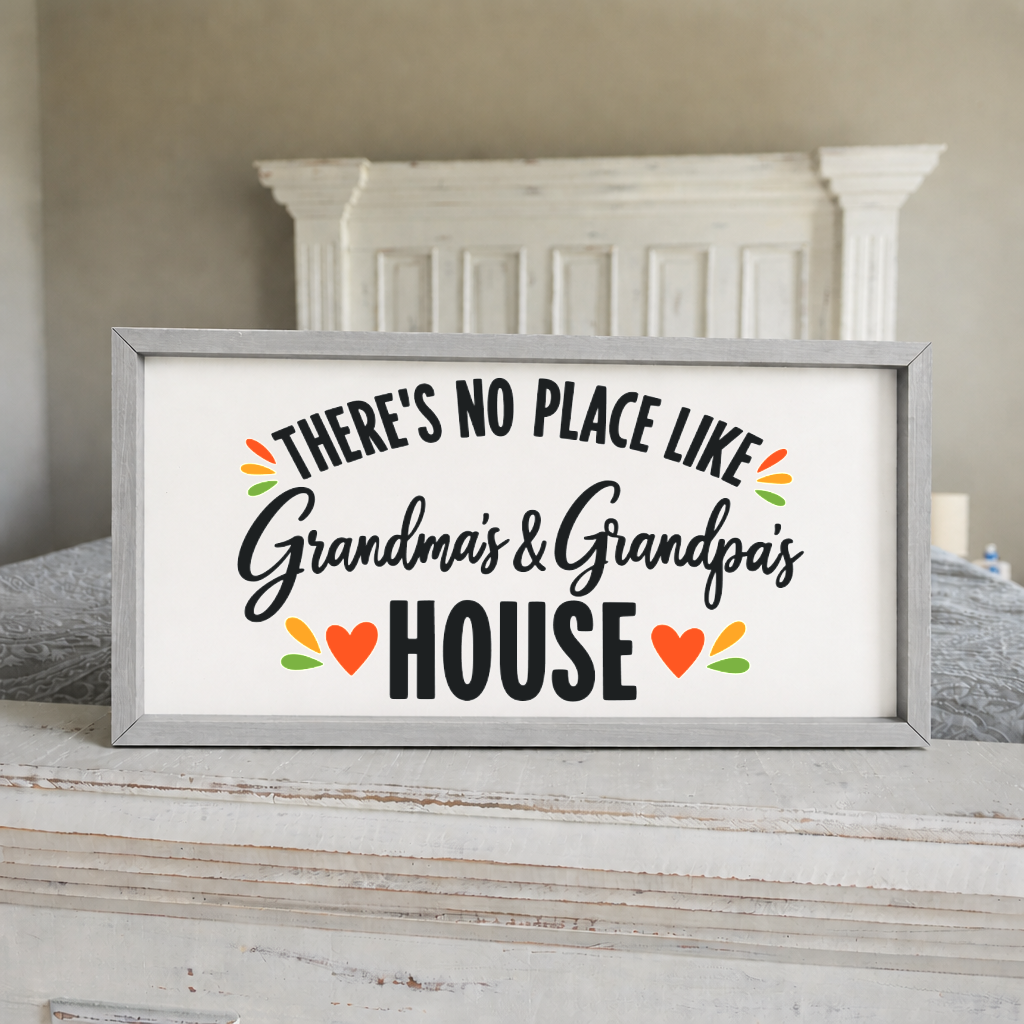 There's No Place Like Grandma's & Grandpa's House wide framed sign with a grey frame on a white mantel