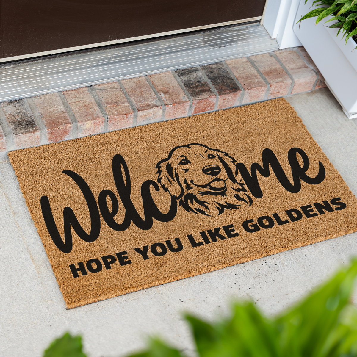 Golden retriever doormat with a golden face in the word Welcome