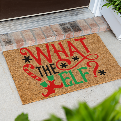What The Elf coir doormat at an angle in front of a brick step