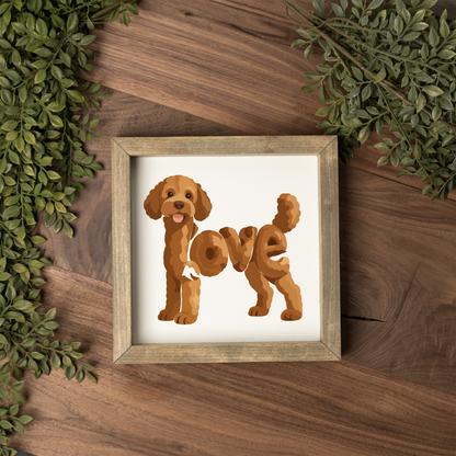 Standing red doodle love square framed sign with a weathered wood frame on a dark wood table with greenery